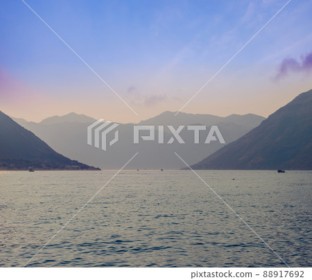 Sunset, beautiful landscape with silhouettes of trees. Travel concept. Montenegro, Kotor Bay. Sunset at Kotor Bay Montenegro. View of the sunset in Boko-Kotor Bay in Montenegro. Silhouettes of Sunset, beautiful landscape with silhouettes of trees. Travel concept. Montenegro, Kotor Bay. Sunset at Kotor Bay Montenegro. View of the sunset in Boko-Kotor Bay in Montenegro. Silhouettes of 88917692
