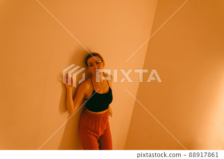portrait of a young woman with spot light portrait of a young woman with spot light 88917861
