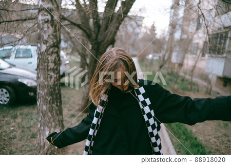 woman walking in the park 88918020