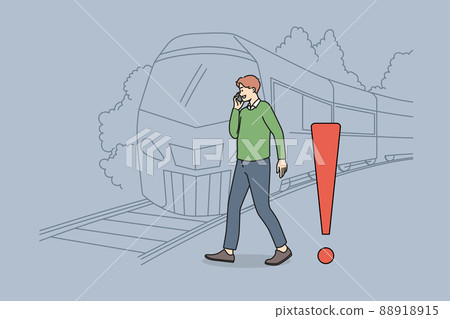 Man talk on phone ignore railroad track safety rules Man talk on phone ignore railroad track safety rules 88918915