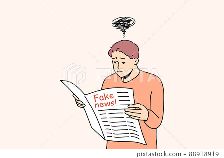 Confused man doubtful about disinformation in newspaper  88918919
