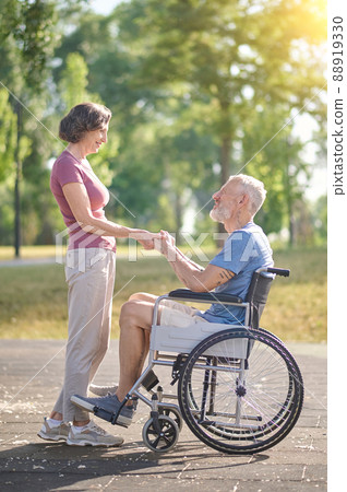 A couple spending a day in a park and looking happy 88919330