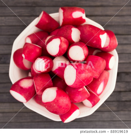 cooked crispy radish in white bowl on wooden table cooked crispy radish in white bowl on wooden table 88919619