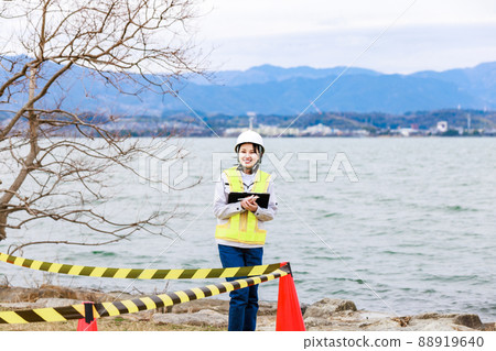Workers operating drones 88919640