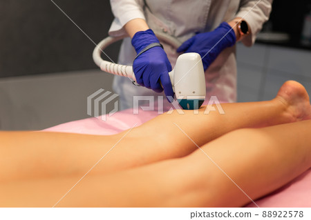 Laser depilation leg hair removal therapy Laser depilation leg hair removal therapy 88922578