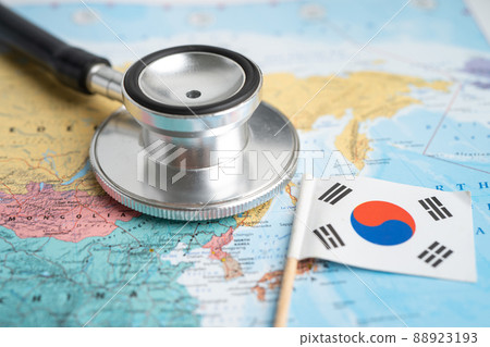 Bangkok, Thailand - February 1, 2022 Black stethoscope with Korea flag on world map background, Business and finance concept. 88923193