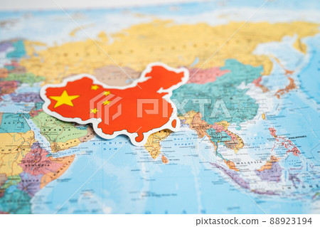 Bangkok, Thailand - February 1, 2022 China flag on world map background. Bangkok, Thailand - February 1, 2022 China flag on world map background. 88923194