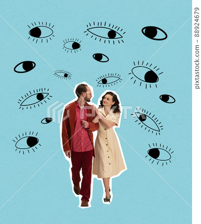 Contemporary art collage. Young loving couple walking under many eyes looking isolated over blue background. Making gossips 88924679