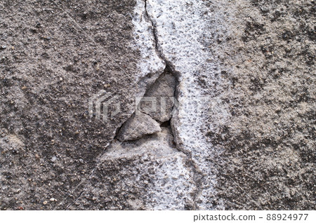 Deteriorated and cracked concrete slope Deteriorated and cracked concrete slope 88924977