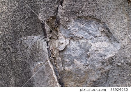 Deteriorated and cracked concrete slope Deteriorated and cracked concrete slope 88924980