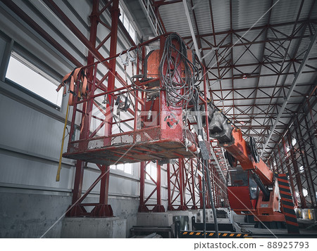 Basket of telehandler inside of hangar Basket of telehandler inside of hangar 88925793