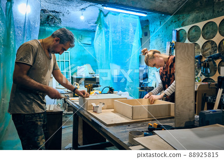 Working progress at carpenter workshop Working progress at carpenter workshop 88925815