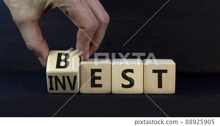 Best invest symbol. Businessman turns a wooden cube and changes the word Invest to Best. Beautiful grey table, grey background. Business and best invest concept. Copy space. Best invest symbol. Businessman turns a wooden cube and changes the word Invest to Best. Beautiful grey table, grey background. Business and best invest concept. Copy space. 88925905