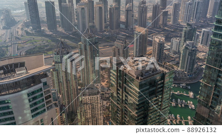 JLT and Dubai Marina skyscrapers intersected by Sheikh Zayed Road all day timelapse JLT and Dubai Marina skyscrapers intersected by Sheikh Zayed Road all day timelapse 88926132