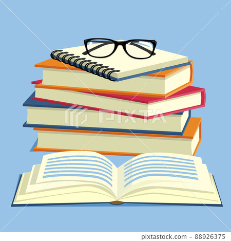 A stack of books and notebooks, glasses 88926375