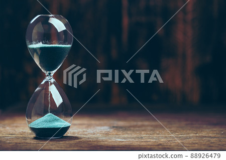 hourglass with green sand hourglass with green sand 88926479