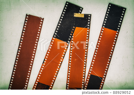 Set of 35mm negative film strip, vintage background with intentional grain, noise, dust, scratches Set of 35mm negative film strip, vintage background with intentional grain, noise, dust, scratches 88929052