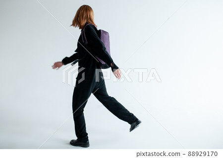 stylish hipster person holding modern backpack bag on white background 88929170