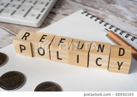 Image of refund policy | Building blocks, calculators, coins, pens with "REFUND POLICY" written on them 88930165