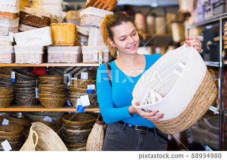 woman customer buying wicker baskets woman customer buying wicker baskets 88934980