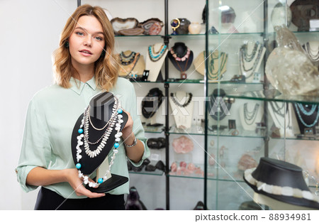 Female demonstrating pearl necklace Female demonstrating pearl necklace 88934981