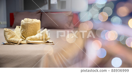 Yellow towel on bed decoration in bedroom interior 88936999