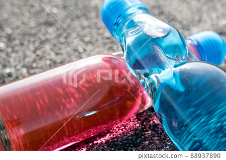 Bottled juice placed on the beach Retro sea Bottled juice placed on the beach Retro sea 88937890