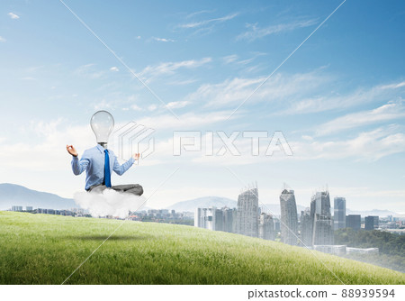 Businessman relaxing and waiting for inspiration Businessman relaxing and waiting for inspiration 88939594