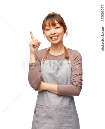 happy woman, chef or waitress pointing finger up 88939975