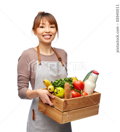 happy smiling female chef with food in wooden box happy smiling female chef with food in wooden box 88940011