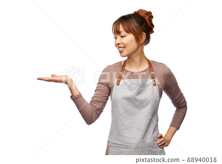 happy female chef or waitress holding something 88940018