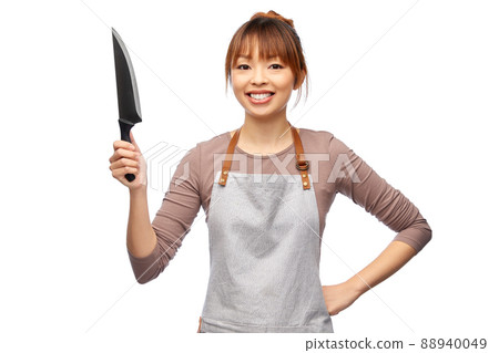 happy smiling female chef with kitchen knife happy smiling female chef with kitchen knife 88940049