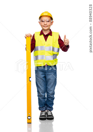 boy with construction level showing thumbs up 88940328