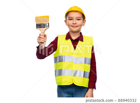 little boy in protective helmet with brush 88940332