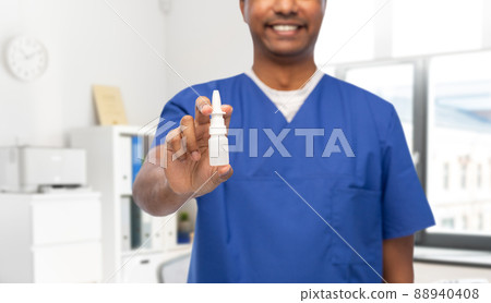 smiling doctor or male nurse with medicine smiling doctor or male nurse with medicine 88940408
