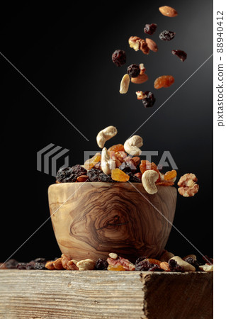 Flying dried fruits and nuts. Flying dried fruits and nuts. 88940412
