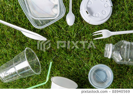 close up of plastic waste on grass 88940569