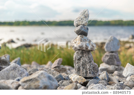 close up of stone pyramids or towers on beach close up of stone pyramids or towers on beach 88940573
