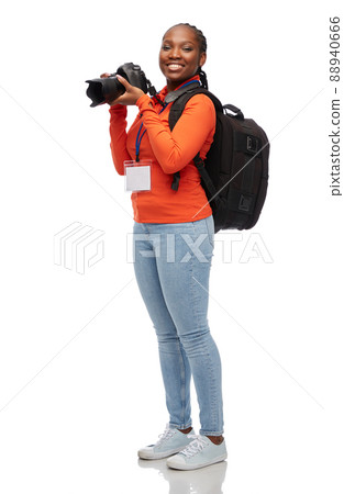 woman photographer with camera and conference id 88940666