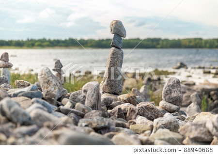 close up of stone pyramids or towers on beach close up of stone pyramids or towers on beach 88940688