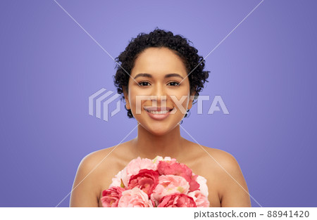 portrait of african american woman with flowers 88941420