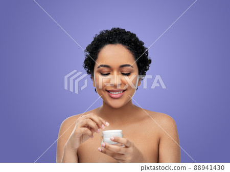 young african american woman with moisturizer 88941430