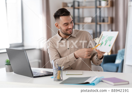 teacher with world map having online class at home teacher with world map having online class at home 88942191