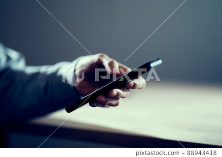 Men's hands spreading bad publicity on SNS Men's hands spreading bad publicity on SNS 88943418