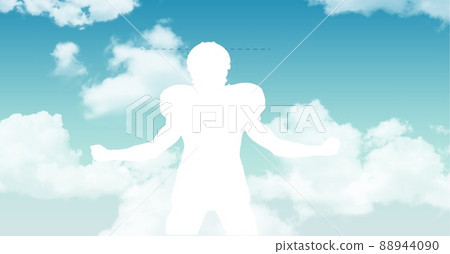 Silhouette of a male rugby player against clouds in the blue sky with copy space 88944090