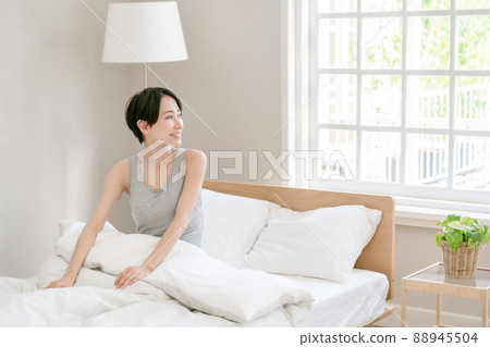 Morning awakening woman bed Morning awakening woman bed 88945504