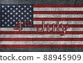 4th of July text on American flag on denim jeans textured abstract background concept. The National indendence day on USA flag frabric texture. 88945909