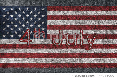 4th of July text on American flag on denim jeans textured abstract background concept. The National indendence day on USA flag frabric texture. 4th of July text on American flag on denim jeans textured abstract background concept. The National indendence day on USA flag frabric texture. 88945909