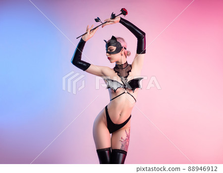 sexy woman in a leather cat mask with a leather rose bdsm in underwear sexy woman in a leather cat mask with a leather rose bdsm in underwear 88946912