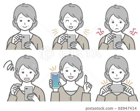 Elderly woman operating a smartphone 88947414